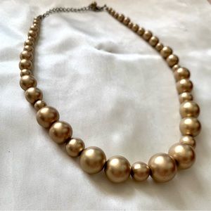 Matte gold large faux pearl necklace